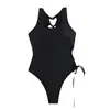 Traje de baño nuevo de una pieza para mujer, color liso, cintura hueca, sexy, adelgazante, para aguas termales, playa