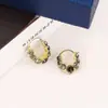 Pendientes nuevos y sencillos pendientes únicos diseño de nicho pendientes de temperamento de alta calidad pendientes de circonita con diamante gris de lujo ligero para mujer