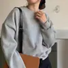 Sudadera gris de cuello redondo estilo americano para mujer, nueva colección de principios de otoño 2026, corte holgado, forrada de felpa, casual y elegante, rejuvenecedora, sin capucha, top de moda