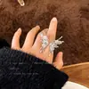 Anel de borboleta novo transfronteiriço, anel de diamante cintilante de temperamento, joia popular, direto da fábrica, Super Brilhante