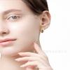 Pendientes de botón con forma de bola de gota de agua hueca de estilo metálico de moda europea y americana, pendientes de diseño de nicho de personalidad simple para mujer, pendientes de alta calidad