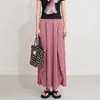 Saia plissada casual estilo japonês de Miyake para mulheres, novo modelo de verão, com barra irregular e plissados artísticos texturizados