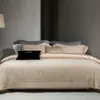 Juego de cuatro piezas de jacquard de tejido grueso de algodón de fibra larga de alta gama estilo italiano, funda nórdica y sábana de cama 100% algodón con textura geométrica para dormir sin ropa