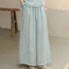Pantalones de algodón y lino de pierna ancha, sencillos y artísticos, bordados para mujer, con cintura elástica, corte holgado y relajado, y longitud de tres cuartos fluida.