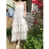 Vestido de Alcinha Branco Doce Redutor de Idade Novo de Verão 2024 Feminino Soltinho para Férias Vestido de Camadas