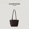 Nueva bolsa de hombro transfronteriza coreana para estudiantes para mujer, ligera, retro, casual, a la moda, bolsa tipo cubo con estampado de lichi