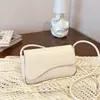 Bolsa feminina transfronteiriça 2026, bolsa de mão simples e bolsa transversal, bolsa quadrada pequena versátil, bolsa de ombro de alta qualidade, bolsa feminina de cor sólida