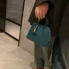 Bolsa con Carcasa de Piel de Oveja 2026 Nueva de Nicho de Gama Alta para Bolos Bolso de Mano de Cuero Genuino Mini Bolso Cruzado de Hombro para Mujer