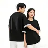Nova Camiseta Casual Artística Xadrez com Gola Dobrável de Manga Curta Unissex para Primavera/Verão Top Falso Duas Peças Tendência