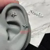 Brincos Estrela Azul e Branca de Quatro Pontas Brilhantes 2026 Novo Design de Nicho Estilo de Luxo Brincos Doces e Cool
