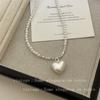 Collar de perlas con colgante de amor simple y elegante para mujer, de moda, con luz fuerte, combina con todo, de alta gama, con un toque elegante y lujoso.