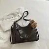 Bolsa Tote Retro de Grande Capacidade para o Dia a Dia Feminina 2026 Nova Casual de Ombro Único Transversal Mochila Multifuncional de Moda