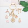 Gotas de aceite rosa transfronterizas accesorios de joyería hechos a mano DIY aleación colgante pequeño llavero pendiente colgante para collar material