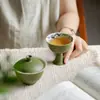 Colección de Juego de Té Estilo Antiguo Pintado a Mano con Diseños Temáticos de Mandarín Verde Pequeño, Bambú Dorado y Viento, Incluyendo Tetera, Gaiwan, Tazas de Té y Tazas de Maestro para Uso Doméstico