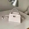 Bolso pequeño de mano para mujer con estampado de cocodrilo, nuevo modelo 2026, simple y elegante, bolso pequeño cuadrado, bolso cruzado de moda para verano