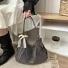Bolsa de Hombro Casual Simple para Viajes de Otoño 2026, Textura Mate Retro, Gran Capacidad, Múltiples Opciones de Transporte