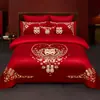 Juego de ropa de cama de lujo estilo chino, hecho de algodón 100% de fibra larga, un juego de cuatro piezas que incluye una sábana y una funda de edredón de algodón puro rojo, perfecto para la alcoba de una recién casada.