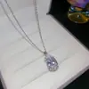 Conjunto de brincos e anel ovais com zircônia da moda, apresentando uma delicada corrente para clavícula com um design luxuoso e sofisticado, uma coleção de joias única e refinada