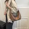 Bolsa de Hombro Retro de Cuero Suave Tipo Dumpling para Mujer 2025 Nueva Bolsa de Hombro/Axila de Gama Alta Estilo Coreano Bolsa Cruzada para el Día a Día