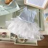 Xt259505 Traje para Niñas 2025 Verano Nuevo Estilo con Cordones y Lazo Estilo Occidental Top Falda de Malla Ropa para Niños