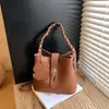Bolsa de Mão Casual Simples de Nicho Estilo Coreano Transfronteiriça para Mulheres 2026 Novo Modelo de Primavera Bolsa de Ombro Único Transversal Estilo Balde