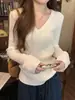 Top de punto casual de manga larga color albaricoque para mujer, talla grande, adelgazante, estilo suave, camiseta base ajustada