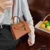 Bolso de Mano Kelly Popular Transfronterizo para Mujer 2025 Nuevo Estilo Bolso de Hombro Versátil Patrón Granulado de Moda Bolso Cruzado de Celebridad de Internet