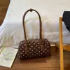 Bolso de mano casual y versátil de lunares para mujer, nueva colección otoño/invierno 2026, bolso de hombro de moda estilo coreano, de alta calidad y elegante
