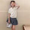 Conjunto de Verano para Niñas 2026 Nueva Moda Elegante Tejido de Seda Helada Manga Corta Conjunto de Falda de Mezclilla para Niños Mayores