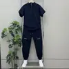 Conjunto Masculino de Verão Novo, Secagem Rápida, Respirável, Moda, Gola Alta, Meio Zíper, Manga Curta, Malha, Calça Casual, Conjunto Tendência de Duas Peças