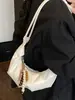 Bolsa de ombro e transversal texturizada simples e estilosa estilo coreano para mulheres, nova bolsa de ombro para o dia a dia outono 2026