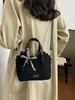 Bolsa de mão feminina transfronteiriça, novo estilo versátil, bolsa tipo saco para o dia a dia, bolsa tote de ombro de grande capacidade, bolsa feminina