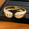 Pulsera redonda abierta de estilo europeo y americano transfronterizo cepillada, con un diseño exagerado y único, una pieza de joyería moderna y a la moda para mujer
