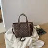 Bolso de Mano Retro para Mujer 2026 Nueva Moda de Otoño Nicho Súper Popular Bolso de Hombro para el Trabajo Bolso Cruzado Tipo Cubo