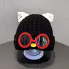 Bonitos y adorables gorros de otoño e invierno para niños, con diseño de poner, material de punto y una serie de dibujos animados, que brindan abrigo y protección para los oídos para bebés y niños pequeños.