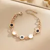 Pulsera de acero de titanio de cuerpo entero de venta caliente transfronteriza para mujer, temperamento de lujo ligero, coreana, galvanoplastia de oro real de 18K, venta al por mayor de joyería