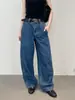 Jeans de lavagem vintage desconstruído na costura lateral, cintura alta, modelador e casual, relaxado e estiloso