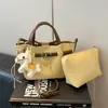 Bolsa de Mão Super Popular para Escritório Feminina 2026 Novo Modelo Bolsa de Ombro Transversal para o Dia a Dia com Toque de Luxo, Bolsa Saco Estilo Cesta