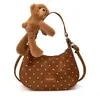 Bolsa de Ombro Retro com Bolinhas e Formato de Meia-Lua Estilo Mesclado Feminina Pequena Bolsa de Mão Fofa com Pingente Estilo Transversal Feminina Pequena Bolsa