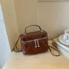 Bolso bandolera acolchado con cadena estilo Chanel transfronterizo, bolso de mano para salir, bolso de hombro, nuevo bolso cuadrado pequeño simple de moda 2026