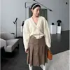 Otoño 2024 Nuevo Corea del Sur Chic Retro Cintura Alta Adelgazante Combinable en Todo Cuero PU Falda Plisada 2 Colores