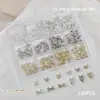 Accesorios para Uñas Artísticas Caja de 12 Compartimentos Mariposa Metálica Mixta Cuervo Corazón Cruz Cinta Lazo Decoración para Uñas de Forma Especial
