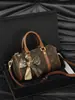 Bolso tipo almohada Boston Nuevo Verano 2026, Bolso de mano estampado de alto valor para mujer, Bolso cruzado con monograma de lujo ligero para mujer