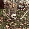 Traje de mano con garra de esqueleto de calavera de Halloween, simulación para insertar mano de calavera, accesorios de decoración de casa embrujada, fábrica al por mayor