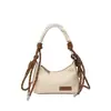 Bolsa de mão de tecido nicho coreana, bolsa de ombro da moda feminina, bolsa transversal estilosa e sofisticada