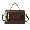 Bolsa de Mão Quadrada Pequena Retro Simples para Mulheres Nova Coleção Primavera 2026 Moda Casual Bolsa de Ombro Personalizada Bolsa Transversal Ins