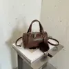 Bolso de mano de estilo vintage transfronterizo, bolso tote pequeño, nueva colección 2026, bolso tipo almohada simple, bolso de hombro y bolso cruzado versátil para el día a día