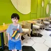 Bolsa de Peito Infantil Letras Estilo Coreano Moda Casual 2022 Nova Viagem Passarela Crianças Pequenas e Alunos do Ensino Fundamental Masculino Bolsa de Cintura Tesouro