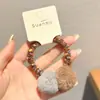 Elástico de Cabelo de Veludo de Alta Qualidade com Pom-Pom, Novo Estilo 2026, Elástico para Coque com Laço, Scrunchie de Ursinho Delicado para Mulheres