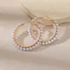 Venta al por mayor de pendientes grandes de aro estilo coreano con perlas y cristales, un accesorio moderno y lujoso para mujer, con un diseño único y vintage